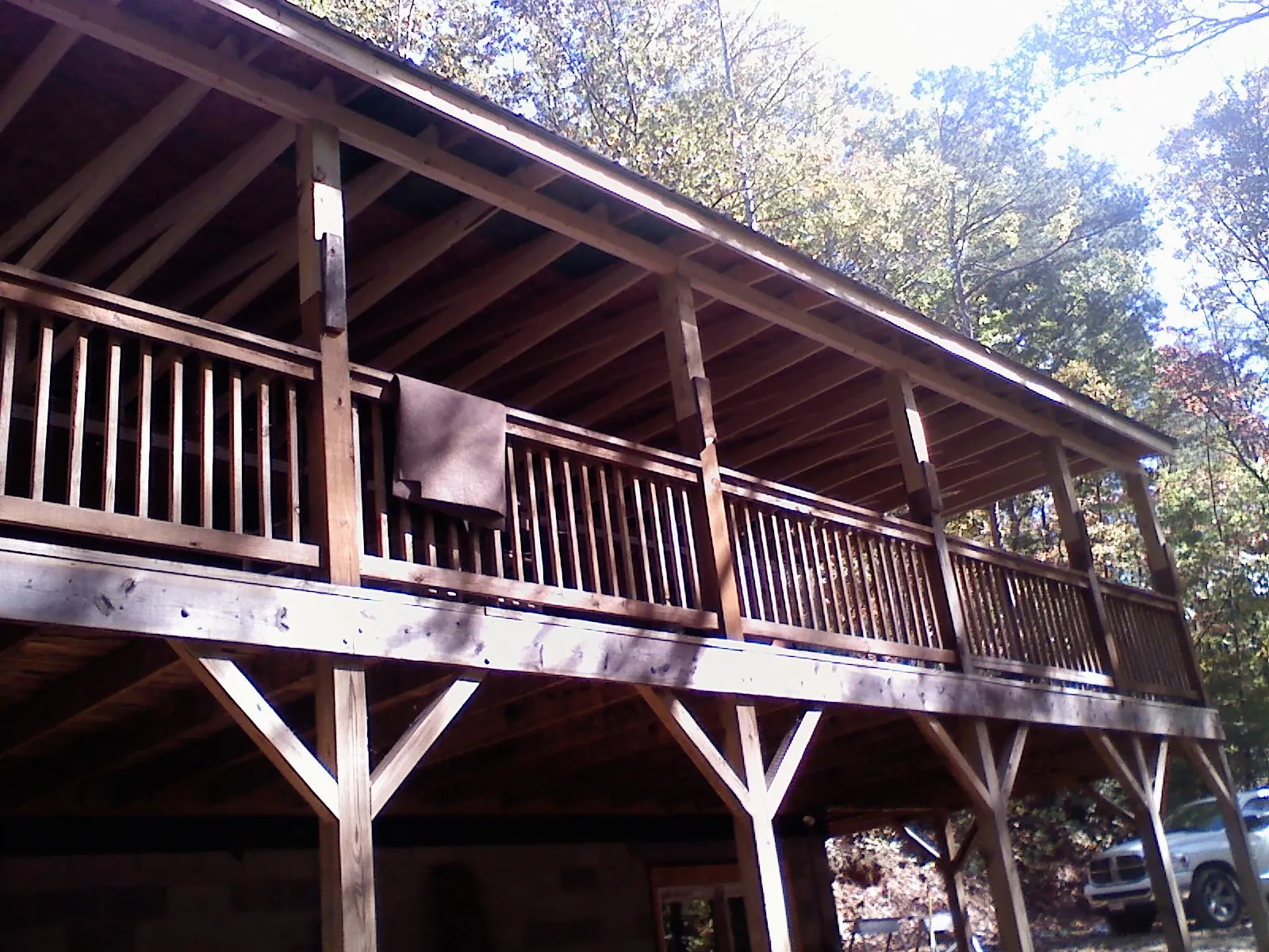 Timber framing under a new elevated porch and deck — Roof Leak Repair in Tustin by Roofing Brothers